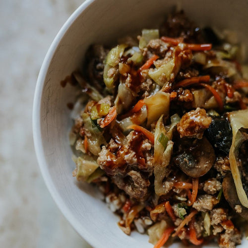 Cabbage with vegetables and ground turkey in a bowl Eat Smart RVA meal delivery service
